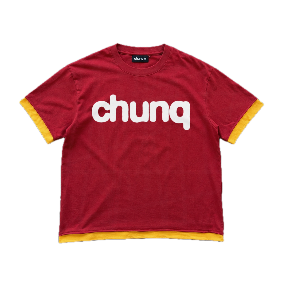 chunq double-layer hero tee red and yellow flat lay